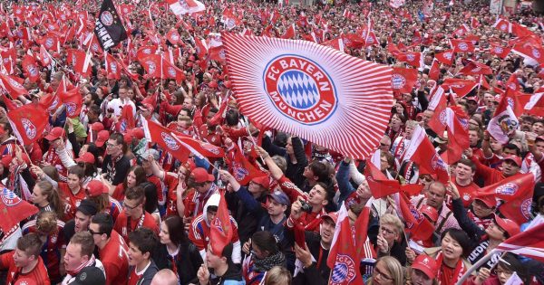 Bayern Munich Fans Wait In Front Of The Town Hall For Their Victory Parade For Winning The German Bundesliga Title In Munich