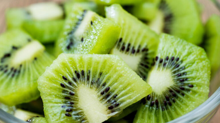 Chopped Kiwi In A Bowl On A Table