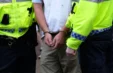 A5y06c Officers Handcuff Detain Man 548903630