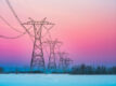 Sunrise Of Prairie With Power Line In Winter, Alberta, Canada.